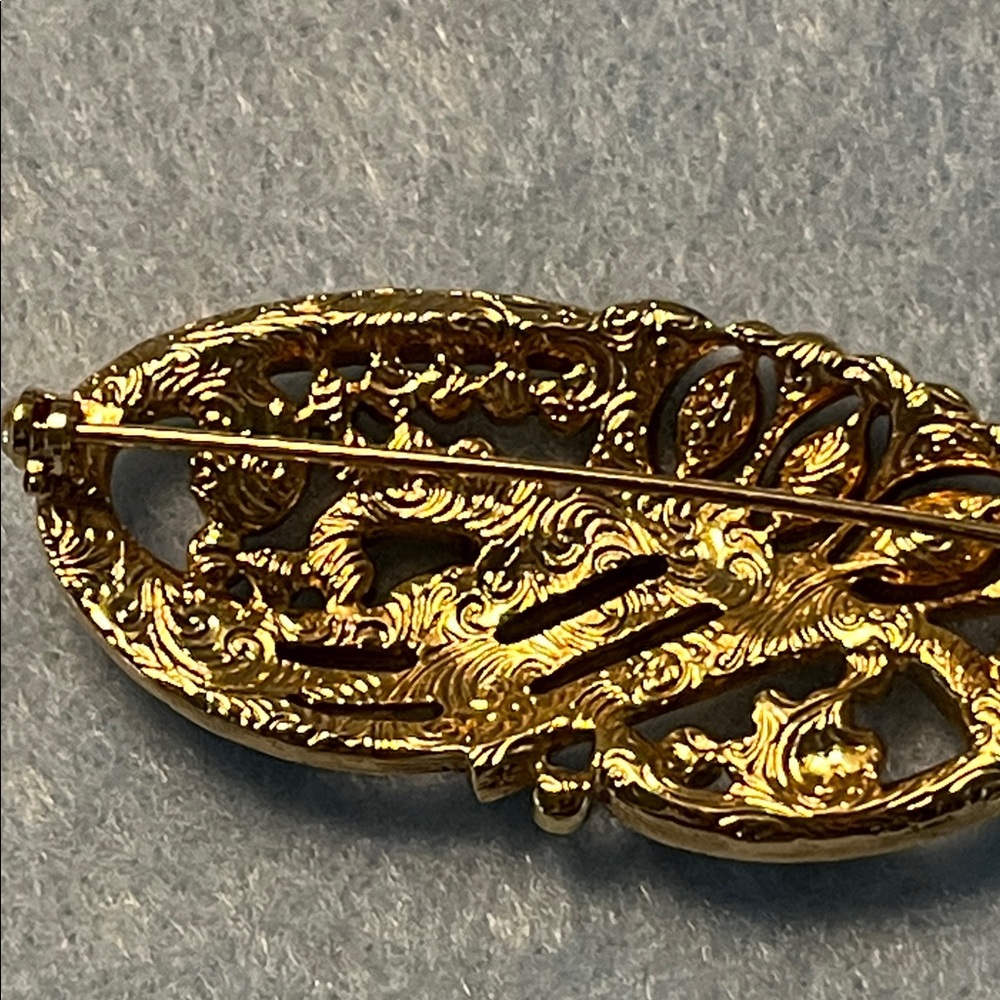 Elegant Gold and Rhinestone Brooch - Picture 3 of 5